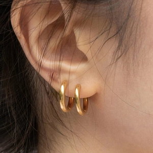 Classic 20mm polished gold hoop earrings for women with minimalist style and thick design