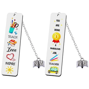 Detailed view of stainless steel bookmarks with book charms and teacher appreciation text