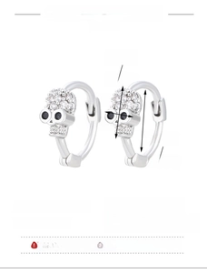 Detailed view of silver skull earrings with zircon inlay and exact measurements