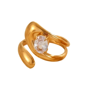 Detail of gold-plated irregular ring band set with an oval-cut clear cubic zirconia