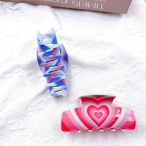Cute heart pattern acrylic hair claw clips in red and blue for elegant styling