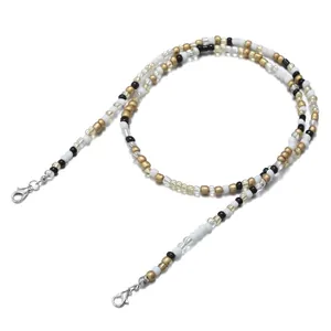 Close-up of colorful beaded lanyard with silver lobster clasps for glasses or masks