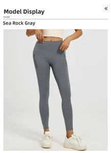 Detail view of high waisted yoga leggings in Sea Rock Grey with mesh side pockets