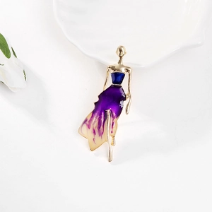 Elegant dancing girl brooch with gradient enamel skirt and gold alloy finish