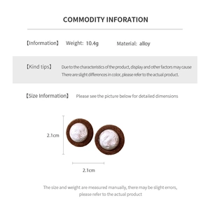 Detailed size and material specs for vintage plush round earrings with faux pearls