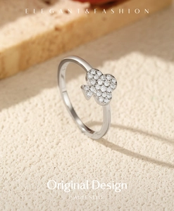 Macro shot of S925 sterling silver ring with clover design and pave zircon setting