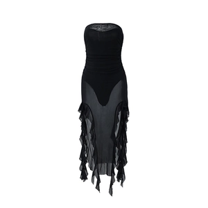 Detail of black strapless mesh dress showing sheer ruffled hem and tiered textures