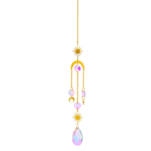 Detail of brass suncatcher with celestial moon star elements and prism crystals
