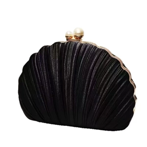 Elegant black shell evening clutch bag with pleated texture and pearl clasp closure