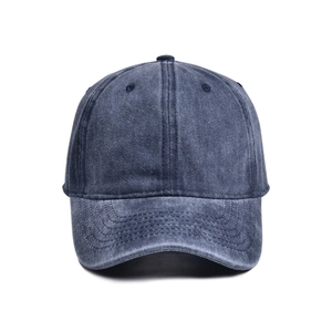 Detailed view of reinforced stitching and breathable eyelets on vintage washed baseball cap