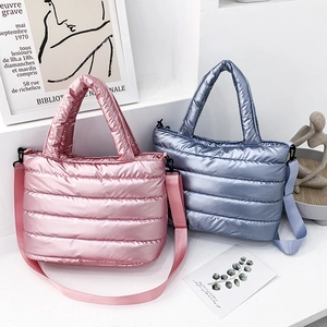 Quilted puffer tote bags in pink and blue with metallic finish and crossbody strap