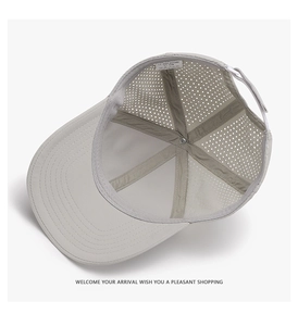 Detail view of quick-dry baseball cap inner mesh, sweatband and size label 57-58cm