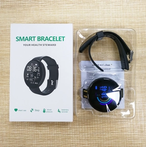 D18 smart bracelet kit with black circular watch, retail box, and user manual