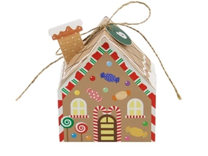 Macro shot of a gingerbread house Christmas box with kraft base and colorful prints