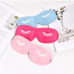 Detailed flat lay of 3D eyelash sleep masks in light blue, rose red, and soft pink shades