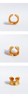 Detail view of the wave-textured gold leaf ring showing its unique handcrafted matte finish