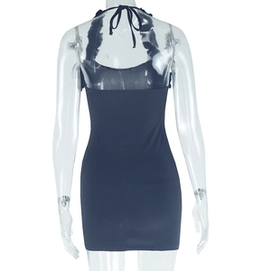 Back view of a black backless mini dress with ruffle straps on a female mannequin