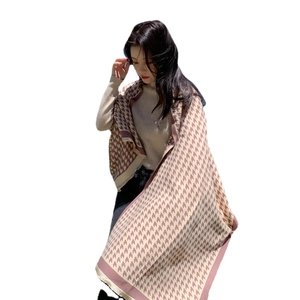 Pink houndstooth cashmere-like oversized scarf wrap for women shown on model
