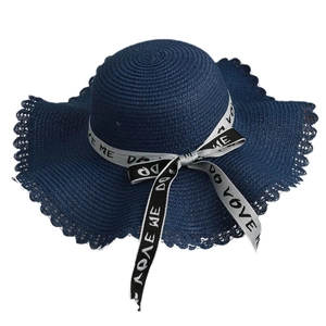 Dark blue wide brim straw hat with bow ribbon and lace edge for summer beach protection