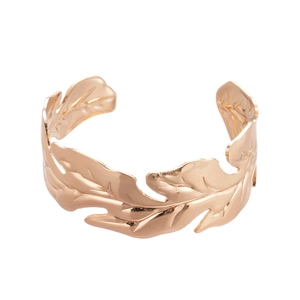 Minimalist golden leaf open cuff bracelet with polished finish on white background