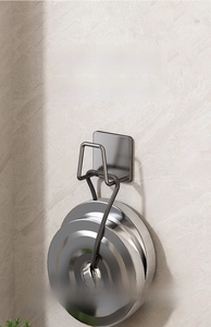 Strong wall mount hook for cutting board holding heavy metal weights on marble tile