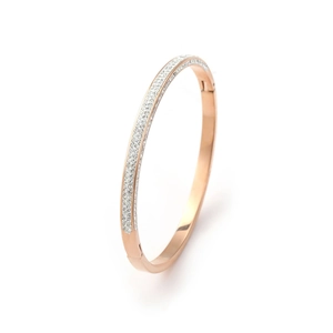 Macro shot of rose gold finish bracelet with micro-paved white crystal diamonds detail