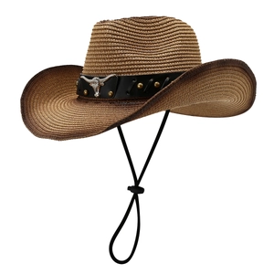 Brown woven cowboy straw hat with bull head leather band and adjustable drawstring