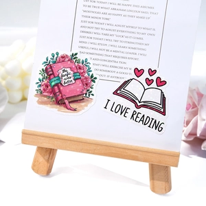 Detail of holographic vinyl stickers featuring floral books and I love reading text