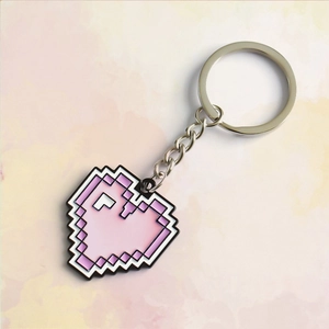 Cute pixel art heart gamepad keychain with pink gradient for retro gaming style