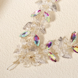 Close-up of handmade double-layer headband with iridescent crystals and silver beads