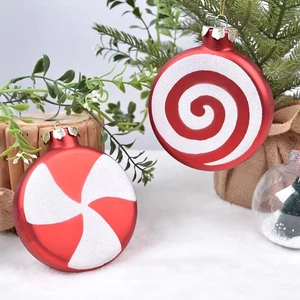 Set of 4 red and white electroplated Christmas ornaments with spiral and windmill patterns