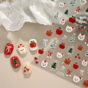 Christmas nail stickers with cartoon cats and apple patterns for festive holiday nail art