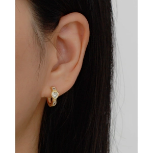 Elegant s925 silver heart huggie hoop earrings with sparkling diamonds on female model