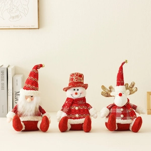 Three Christmas plush gnomes set featuring Santa, snowman and reindeer with knit textures