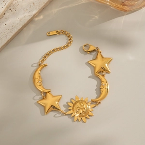 Elegant gold celestial bracelet with sun moon and star charms made of stainless steel