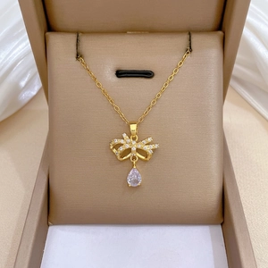 Titanium butterfly jewelry set with purple pear pendant and crystals in a luxury box