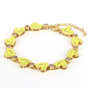 Bohemian gold bracelet featuring yellow enamel hearts and sparkling zircon stones