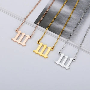 Gothic style letter W necklaces in rose gold, gold, and silver stainless steel finishes