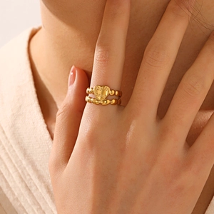 Golden stainless steel heart ring with for ever engraving and beaded band on finger