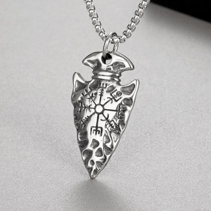 Detail of silver Viking spearhead pendant with Vegvisir compass runes on box chain
