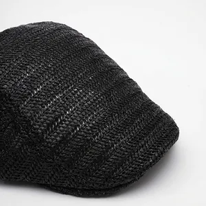 Men's summer black woven sun hat with wide brim design in a stylish newsboy cap style