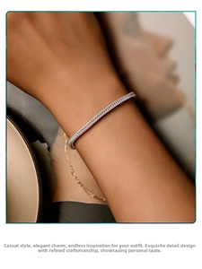 Detail of 925 sterling silver snake bone bracelet showing fine Milan mesh weave texture