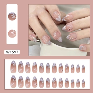 Short almond press-on nails with lavender purple French tips and white daisy floral patterns