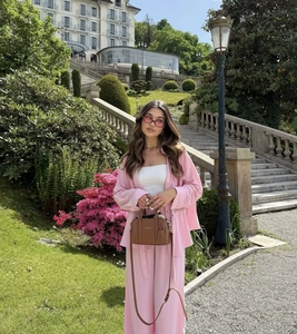 Women casual pink set with wide-leg trousers and flowing long-sleeved shirt for summer