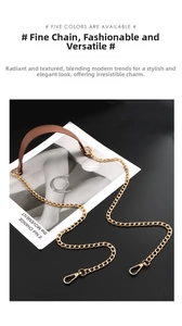 Close-up of golden flat chain strap with brown leather shoulder pad and lobster clasp