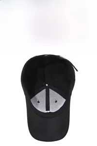 Detail view of black baseball cap interior showing breathable lining and sturdy stitching