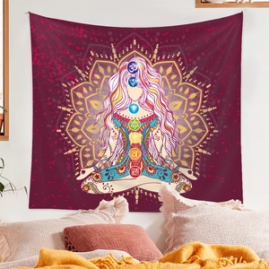 Detail of meditation tapestry showing seven colored chakra symbols on mandala background