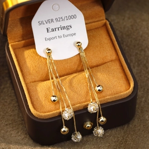 Elegant gold long crystal tassel earrings with 925 silver needles for a premium style