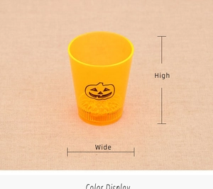 Detail of Halloween pumpkin LED candle cup showing height and width measurement dimensions