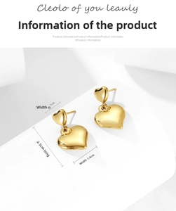 Detailed view of layered gold heart drop earrings with dimensions of 2.5cm in length